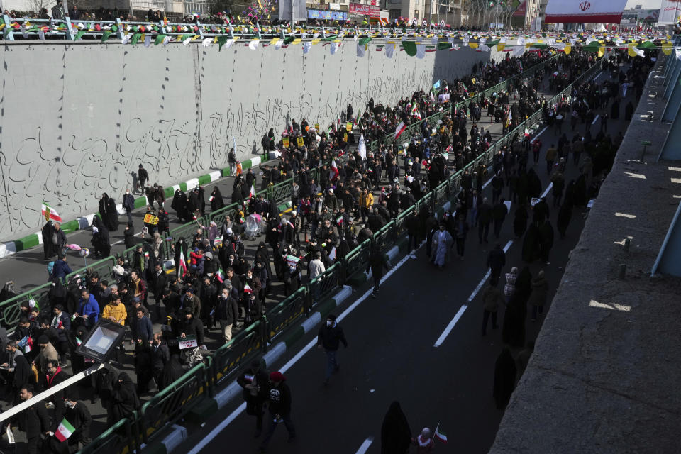 Demonstrators take part in the annual rally commemorating Iran's 1979 Islamic Revolution, in Tehran, Iran, Saturday, Feb. 11, 2023. Iran on Saturday celebrated the 44th anniversary of the 1979 Islamic Revolution amid nationwide anti-government protests and heightened tensions with the West. (AP Photo/Vahid Salemi)