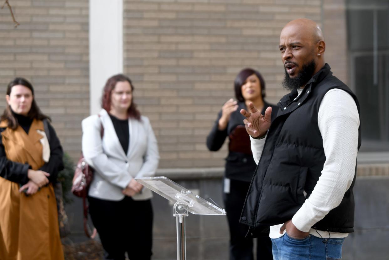 Gino Haynes, community organizer with Canton for All People, talks during a sneak peek event at Canton's Cherrie Turner Towers, which is undergoing renovations.