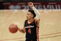 Pepperdine guard Colbey Ross brings the ball up during the second half of the team's NCAA college basketball game against UCLA, Friday, Nov. 27, 2020, in San Diego. (AP Photo/Gregory Bull)