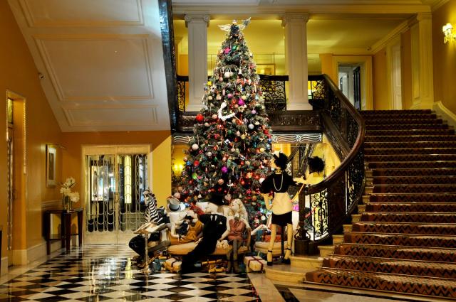 Louis Vuitton stacks travel trunks for Claridge's Christmas tree