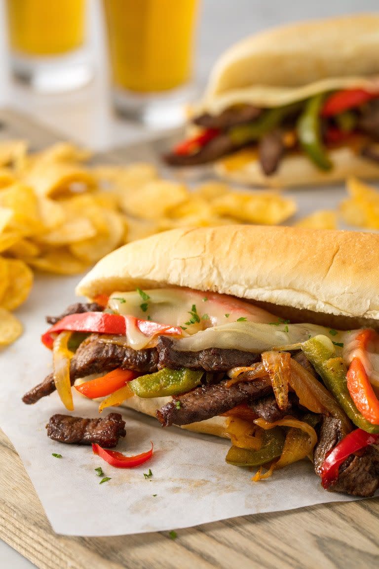 <p>Philly cheesesteaks are iconic—and for good reason. This is our version of the sandwich, and it satisfies our craving every time. </p><p>Get the <a href="https://www.delish.com/uk/cooking/recipes/a29469126/easy-homemade-philly-cheesesteak-recipe/" rel="nofollow noopener" target="_blank" data-ylk="slk:Homemade Philly Cheesesteaks;elm:context_link;itc:0" class="link ">Homemade Philly Cheesesteaks</a> recipe.</p>