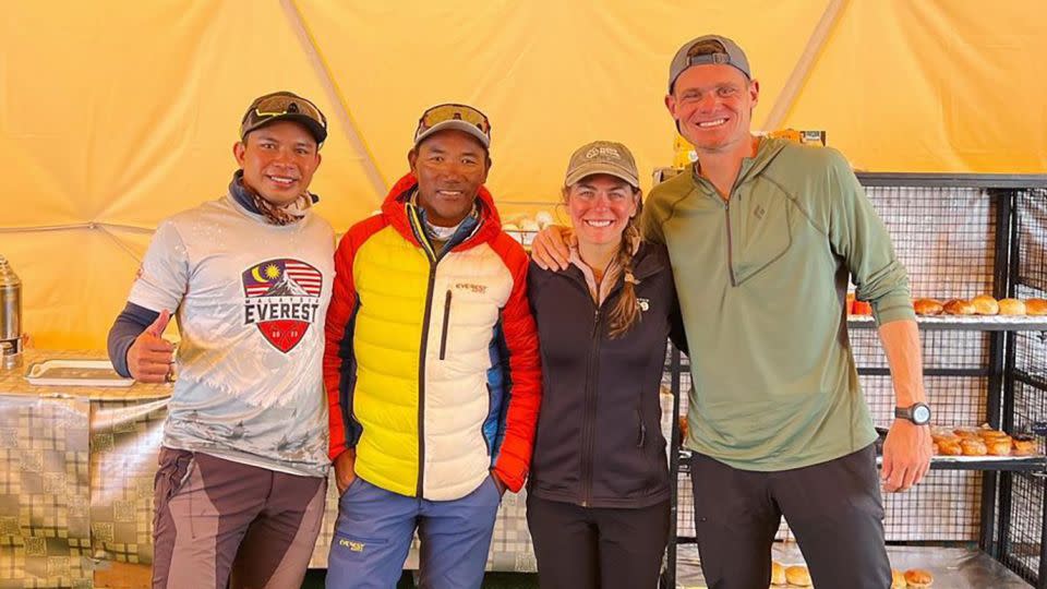 Muhammad Hawari Hashim (far left), all-time Everest record holder Kami Rita Sherpa, Shayna Unger, and Scott Lehmann at Everest base camp. - Courtesy Shayna Unger and Scott Lehmann