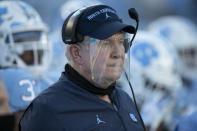 North Carolina coach Mack Brown, wearing a faceshield, watches his team in the first quarter against Notre Dame during an NCAA college football game, Friday, Nov. 27, 2020, at Kenan Stadium in Chapel Hill, N.C. (Robert Willett/The News & Observer via AP)