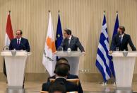 Cypriot President Nicos Anastasiades, Greek Prime Minister Kyriakos Mitsotakis and Egyptian President Abdel Fattah al-Sisi are seen during a news conference after a trilateral summit between Greece, Cyprus and Egypt, at the Presidential Palace in Nicosia