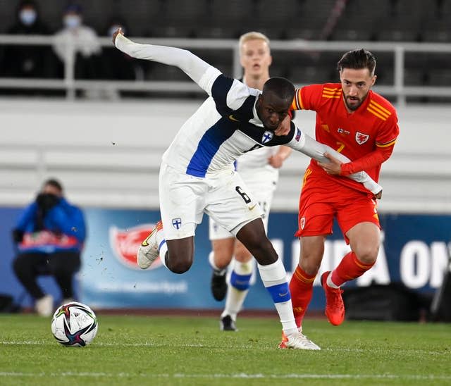 Rangers' Finland midfielder Glen Kamara, battles Joshua Sheehan for the ball 