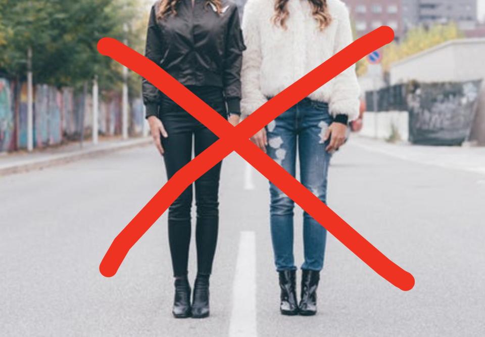 Women wearing skinny jeans with a red X through them