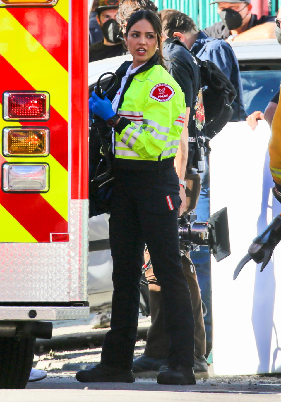 <p>Eiza Gonzalez springs into action as she responds to a car crash on the set of <em>Ambulance</em> in Los Angeles on Monday.</p>