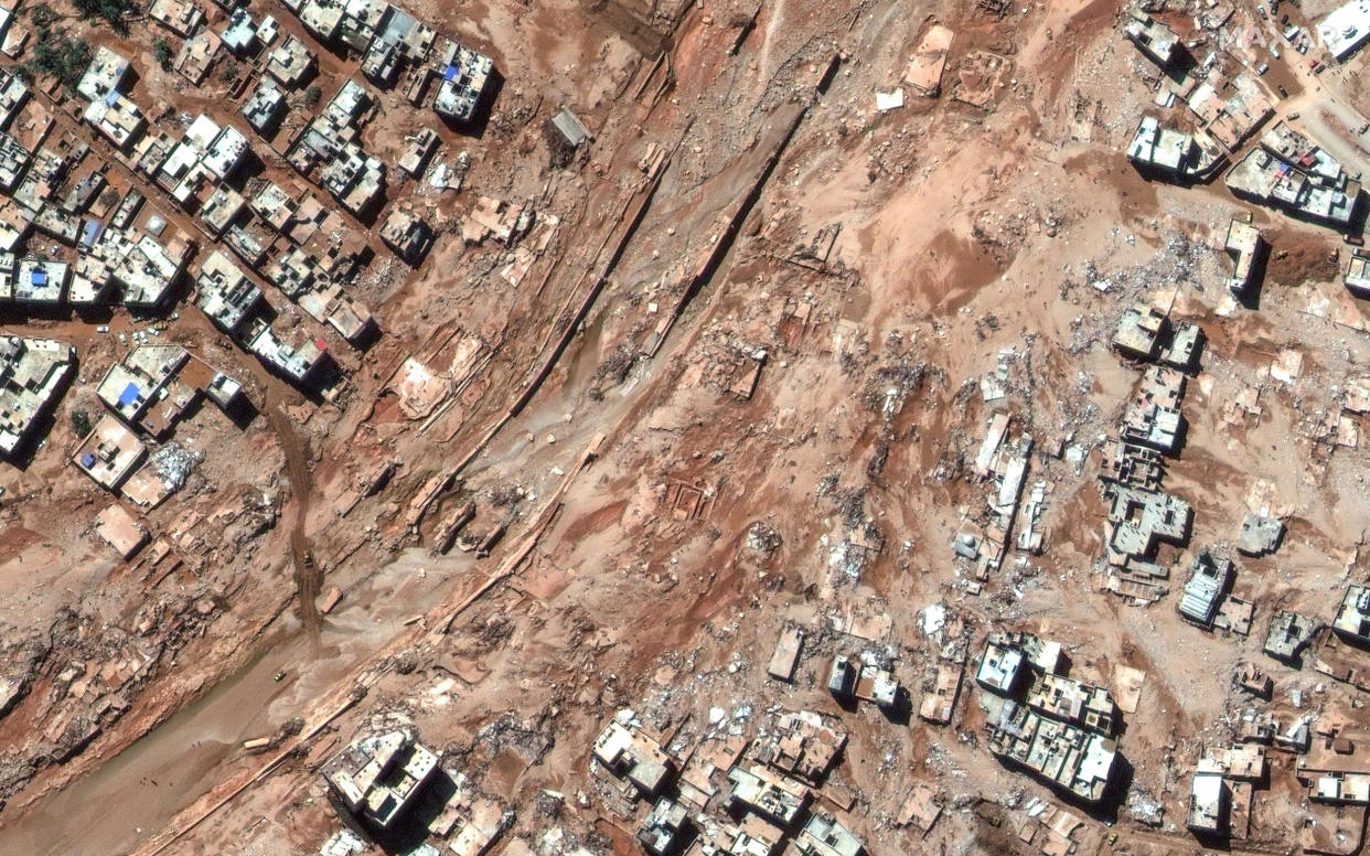 Maxar satellite imagery of streets, neighborhoods and bridges after the catastrophic flooding that struck the Libyan coastal city of Derna.  (Maxar Technologies / DigitalGlobe/Getty Images)