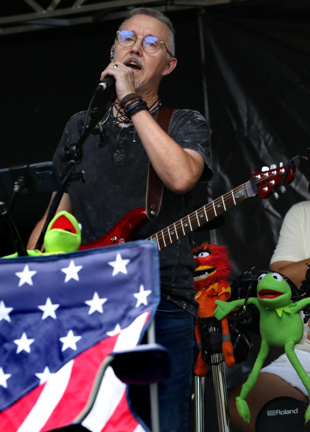 Tangerine Trees’ lead singer, Roger Leonhardt, sings the National Anthem at the opening of North Carolina American Legion 7th Inning Stretch Festival held Saturday, August 6, 2022, in Uptown Shelby.