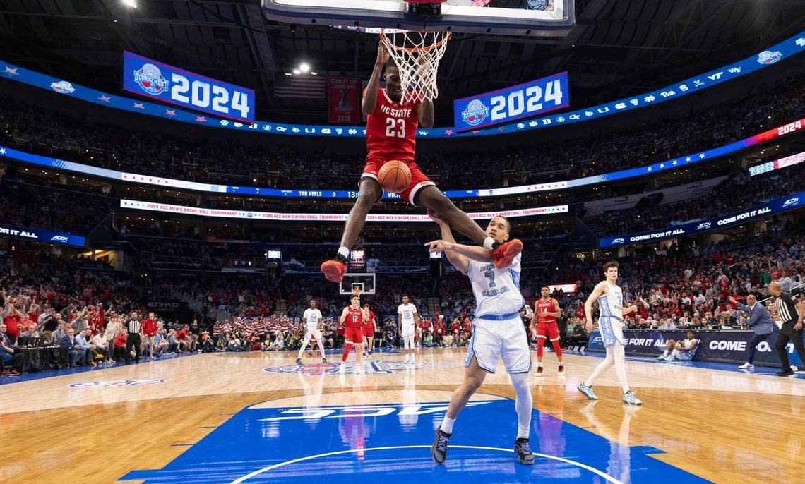 N.C. State’s Mohamed Diarra (23) dunks over North Carolina’s Seth Trimble (7) in the first half during the ACC Men’s Basketball Tournament Championship at Capitol One Arena on Saturday, March 16, 2024 in Washington, D.C.