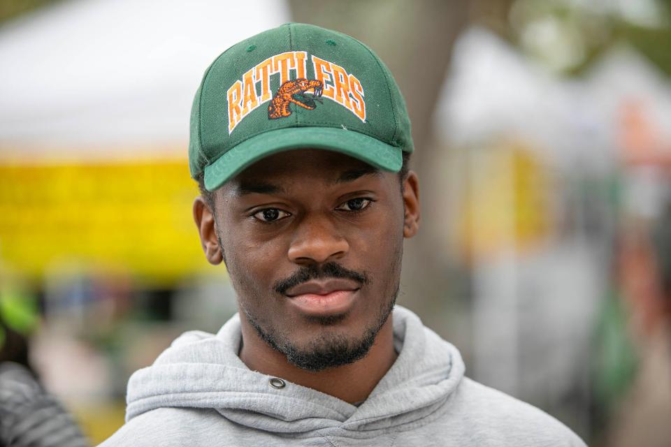 Darnell Walker, 19, during a visit to the Greenmarket December 30, 2023 in West Palm Beach.
