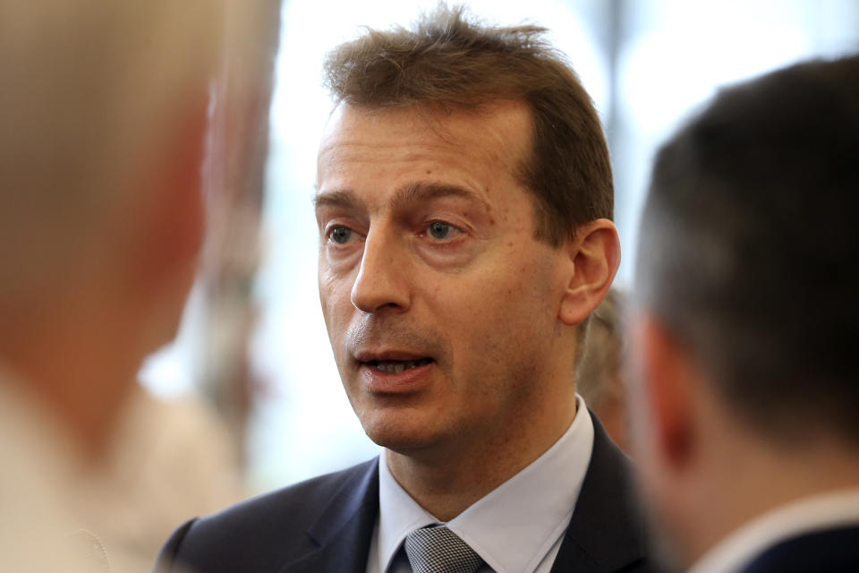 Airbus CEO Guillaume Faury talks to reporters after Airbus annual press conference in Toulouse, southwestern France, Thursday, Feb.13, 2020. Commercial aircraft maker Airbus lost 1.36 billion euros ($1.48 billion) in 2019 because of a multibillion-euro bribery settlement with authorities in three countries, but otherwise saw a record year of aircraft deliveries and increased its dividend. (AP Photo/Frederic Scheiber)