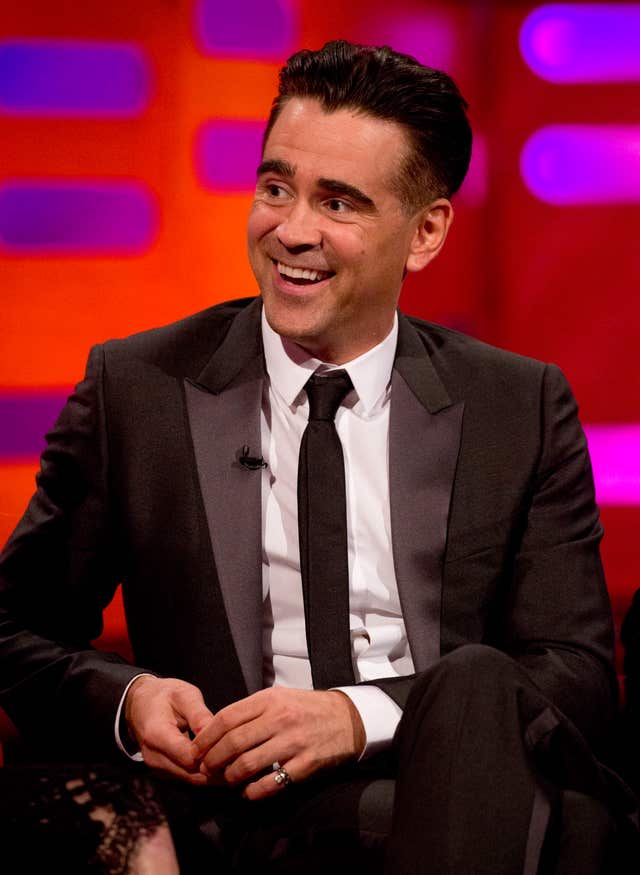 Colin Farrell smiling on sofa on The Graham Norton Show