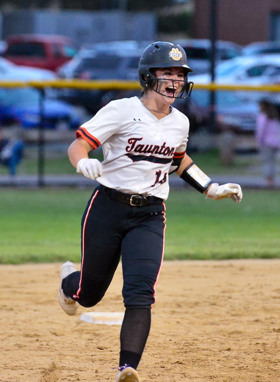 Taunton’s Kaysie Demoura smiles after hitting a home run during the Division 1 Final Four game against Methuen held at Worcester State.