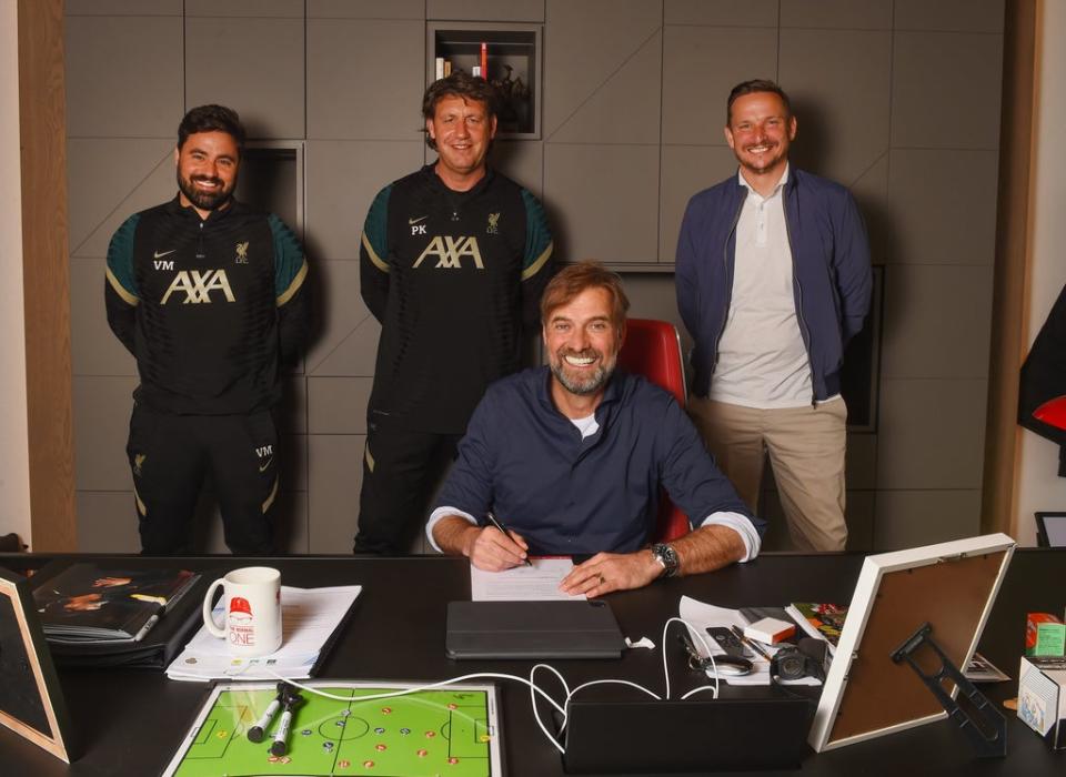 Jurgen Klopp with his staff after signing a new contract at Liverpool (Liverpool FC via Getty Images)