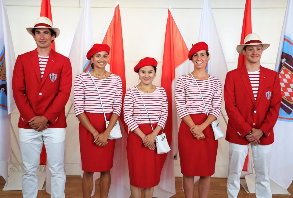 (From L) Monaco's athletes Quentin Antognelli, Marie-Charlotte Gastaud, Xiaoxin Yang, Lisa Pou and Theo Druenne pose during the presentation of Monaco's Olympic team for the Paris 2024 Games, in Monaco on June 27, 2024. (Photo by Valery HACHE / AFP) (Photo by VALERY HACHE/AFP via Getty Images)