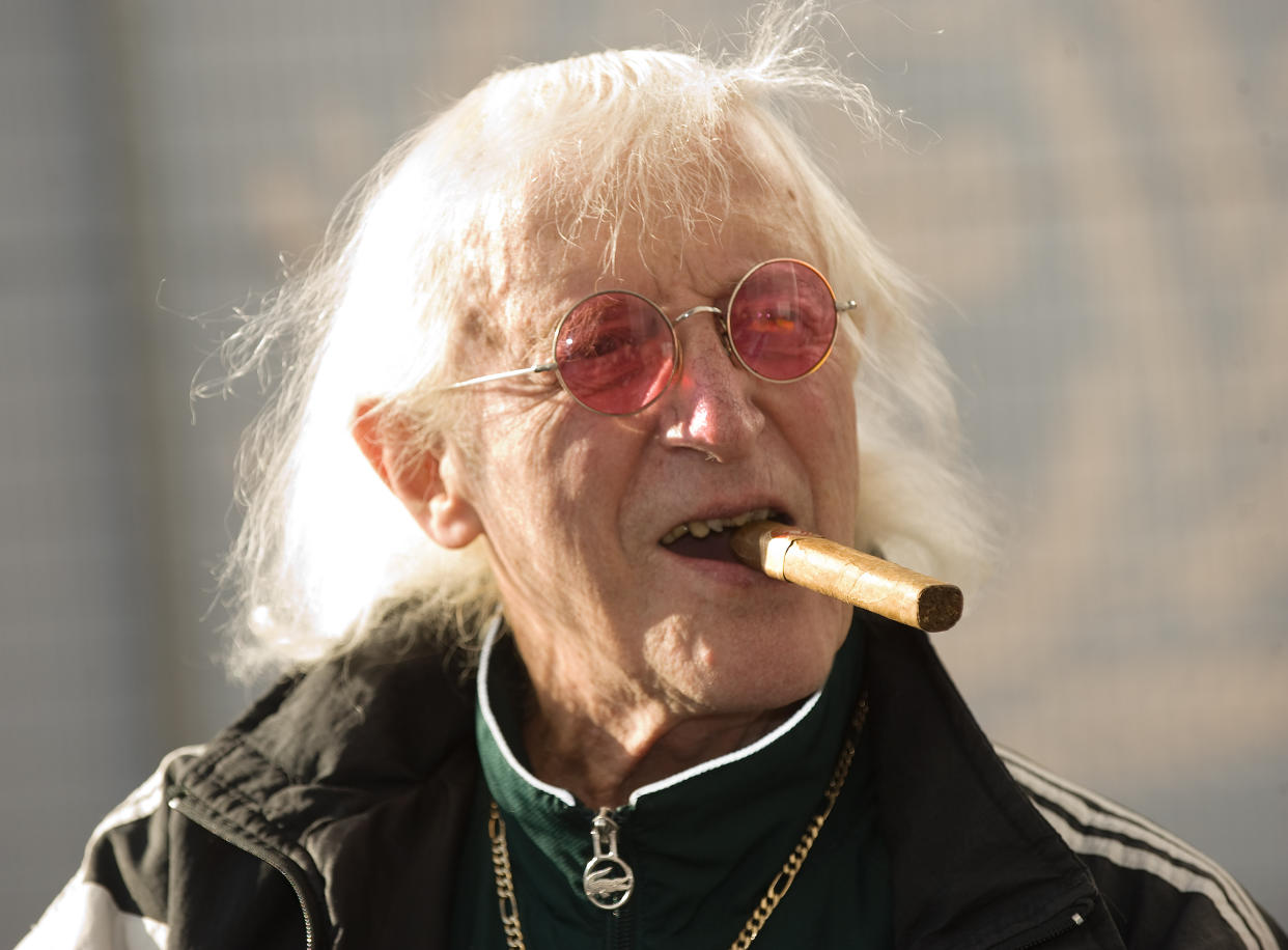 Sir Jimmy Savile attends the ceremony to name Cunard's new cruise-liner Queen Elizabeth II in Southampton Docks in Southampton, England.