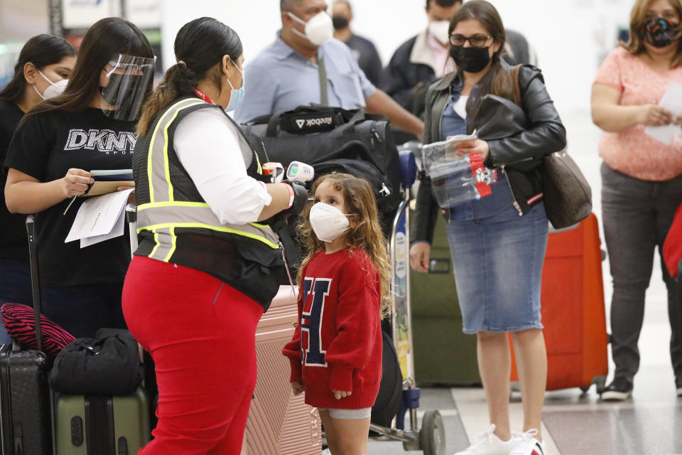 The CDC says symptom-based screening programs at airports are ineffective at detecting COVID-19. (Al Seib/Los Angeles Times)