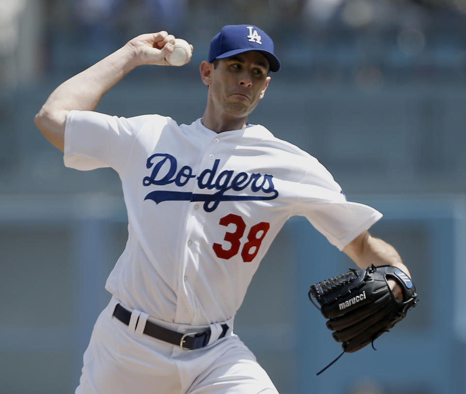 Los Angeles Dodgers pitcher Brandon McCarthy throws to the plate against the San Diego Padres during the first inning of a baseball game in Los Angeles, Thursday, April 6, 2017. (AP Photo/Alex Gallardo)