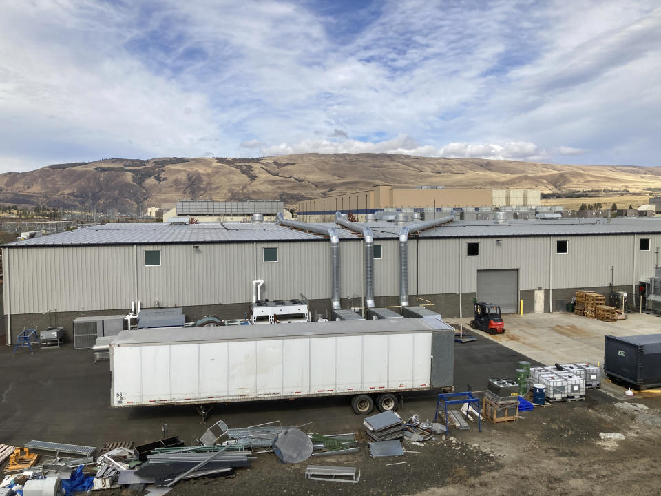 In this Tuesday, Oct. 5, 2021, photo, shows the exterior of a Google data center in The Dalles, Oregon. The Dalles City Council member Long-Curtiss wants to know more details about Google's proposal to build more data centers in the town before the city council votes on the matter. (AP Photo/Andrew Selsky)