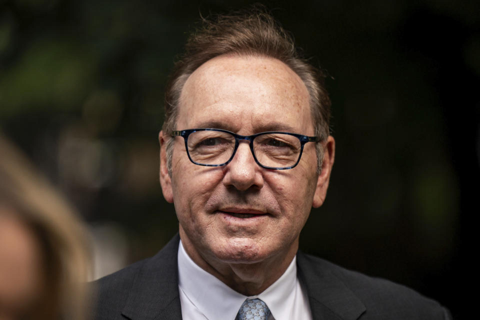 Actor Kevin Spacey looks on as he arrives at Southwark Crown Court, London, where he is charged with three counts of indecent assault, seven counts of sexual assault, one count of causing a person to engage in sexual activity without consent and one count of causing a person to engage in penetrative sexual activity without consent between 2001 and 2005, on Thursday July 13, 2023. (Aaron Chown/PA via AP)