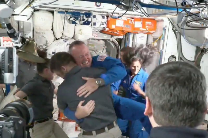 Boeing Starliner astronauts Butch Wilmore and Suni Williams (both dressed in blue) were welcomed June 6 aboard the International Space Station following a successful docking. Starliner launched on a United Launch Alliance Atlas V rocket on June 5 from Space Launch Complex-41 at Florida's Cape Canaveral Space Force Station. File NASA image/UPI