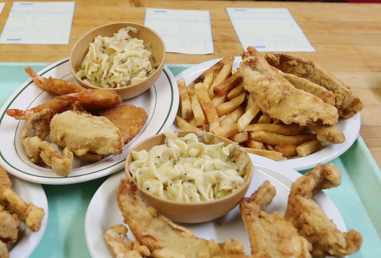 Fried fish and shrimp are ready to be served to patrons at the Polish American Club in Akron.