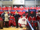 Montreal Canadiens hockey fans purchase jerseys at the Bell Centre during the second away game of the Stanley Cup Finals