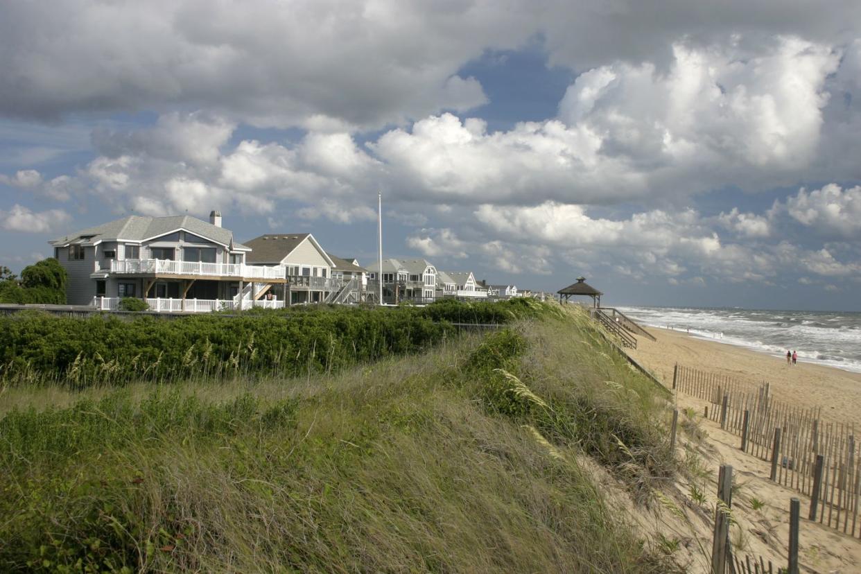 outer banks beach home on small hill overlooking dunes and ocean