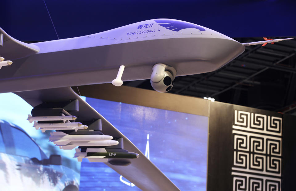 FILE - In this Feb. 25, 2018 file photo, a model of the Wing Loong II weaponized drone for the China National Aero-Technology Import & Export Corp. is displayed at a military drone conference in Abu Dhabi, United Arab Emirates. According to a report by the Royal United Services Institute, or RUSI released Monday, Dec. 17, 2018, the use of armed drones in the Middle East, driven largely by growing sales from China, has grown significantly in the past two years with an increasing number of state and non-state actors using them in regional conflicts. The report found that over the past few years, more and more countries across the Mideast have acquired armed drones, either by importing them or by building them domestically. (AP Photo/Jon Gambrell, File)