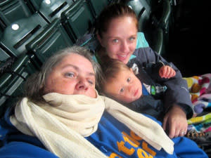 From left: Chelcee's mom, Christine, her son and Chelcee at a Seattle Mariners' game.