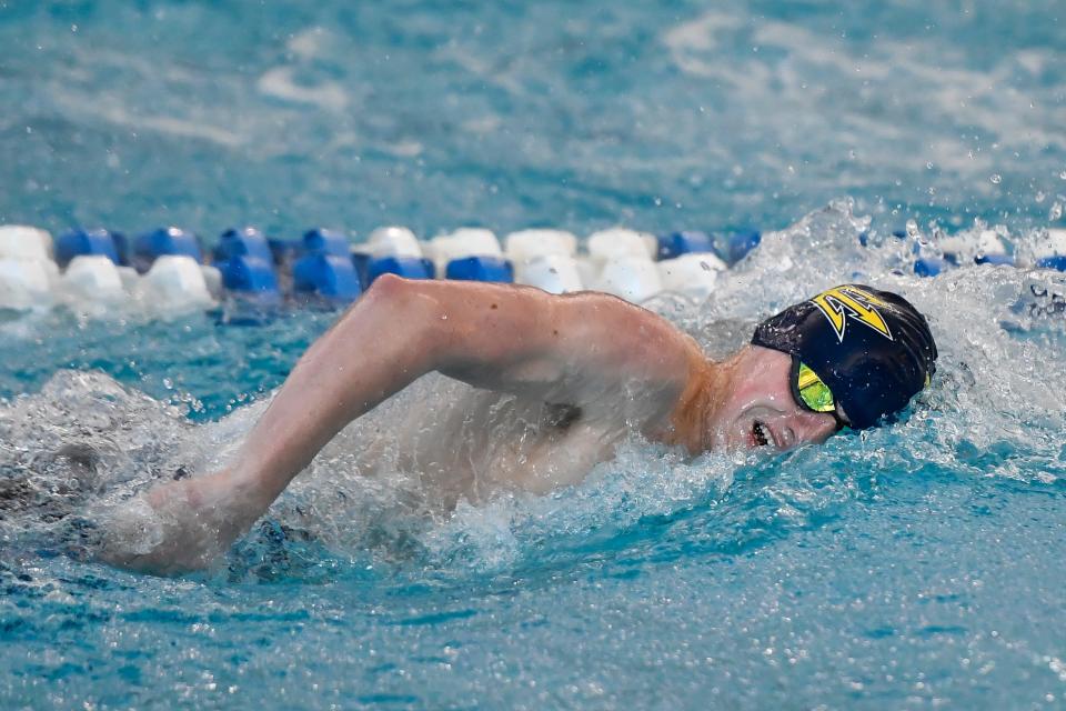 Victor's Alex Crossing swims in a preliminary heat of the 200 yard freestyle during the 2022 NYSPHSAA Boys Swimming & Diving Championships in Ithaca, N.Y., Friday, March 4, 2022.