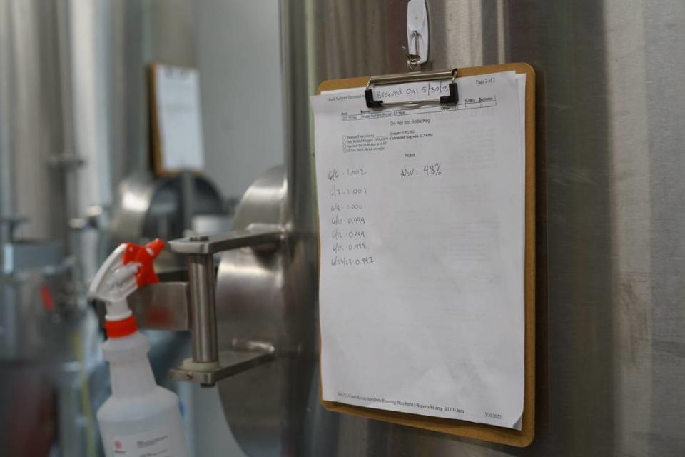 Brethren head brewer Kevin Whitehouse takes “gravity readings,” which show how much sugar is in the mixture, and ultimately how much alcohol is being produced.                            