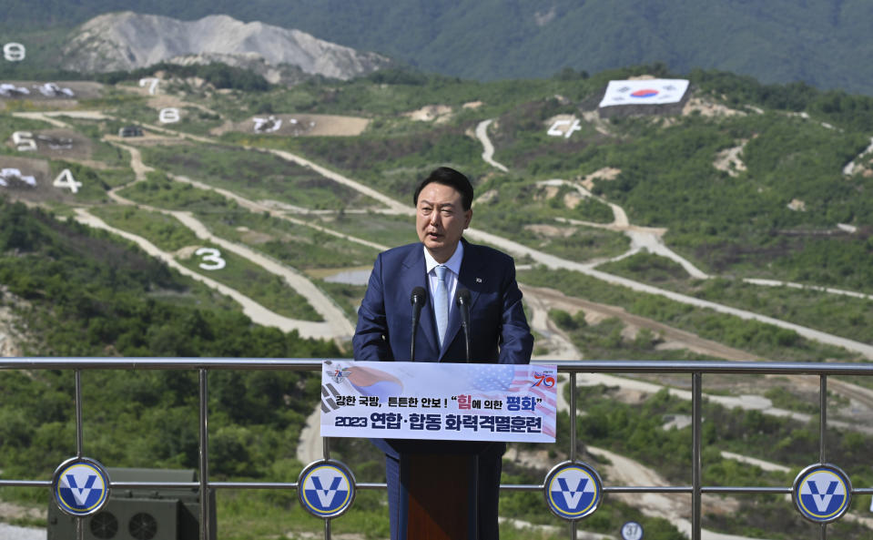 South Korean President Yoon Suk Yeol delivers a speech after a South Korea-U.S. joint military drill at Seungjin Fire Training Field in Pocheon, South Korea Thursday, June 15, 2023. (Jung Yeon-je/Pool Photo via AP)