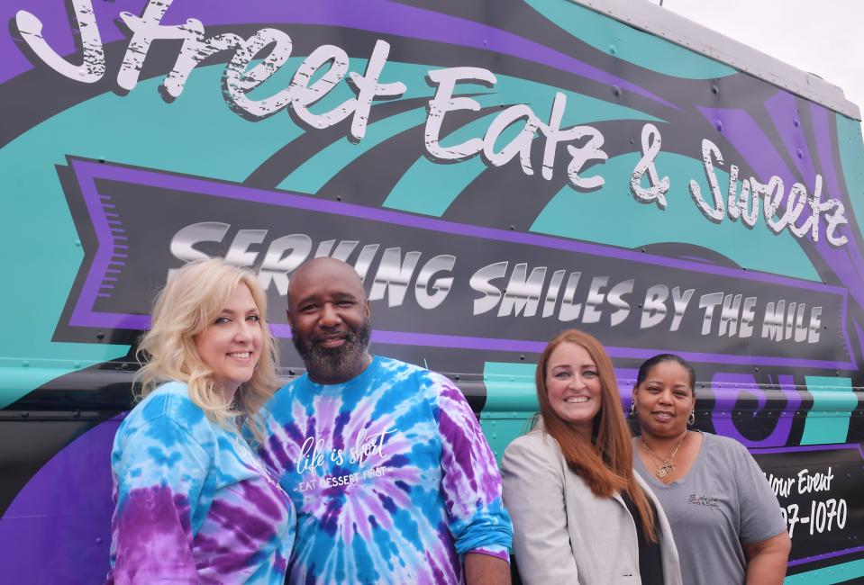 Aspen Street Sweets owners Natalie and Ryan Smith will open a second AJ's Street Kravz food truck in March.  Here, Natalie and Ryan Smith take some time with Autumn Hughes from their marketing team and their manager, Tina Evans.