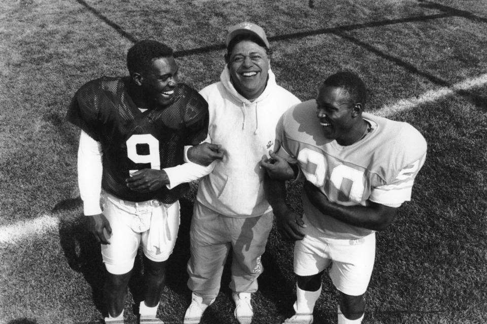 Lions coach Wayne Fontes with QB Rodney Peete and Barry Sanders in 1990.