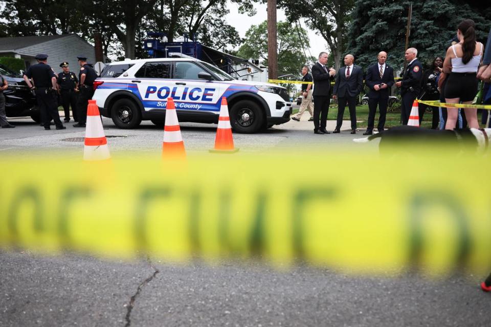 Law enforcement officials are seen as they investigate the home of a suspect arrested in the unsolved Gilgo Beach killings on July 14, 2023 in Massapequa Park, New York. A suspect in the Gilgo Beach killings was arrested in the unsolved case tied to at least 10 sets of human remains that were discovered since 2010 in suburban Long Island. The suspect is Rex Heuermann, Michael M. Santiago/Getty