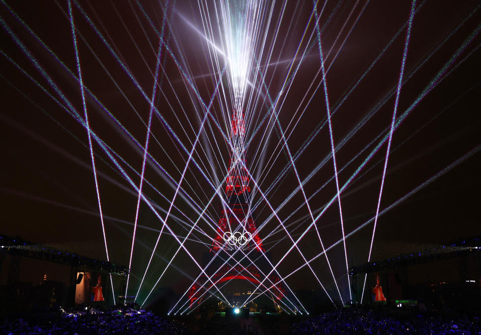 Paris 2024 Olympics - Opening Ceremony - Paris, France - July 26, 2024.  A light show is seen at the Eiffel Tower during the opening ceremony REUTERS/Hannah Mckay