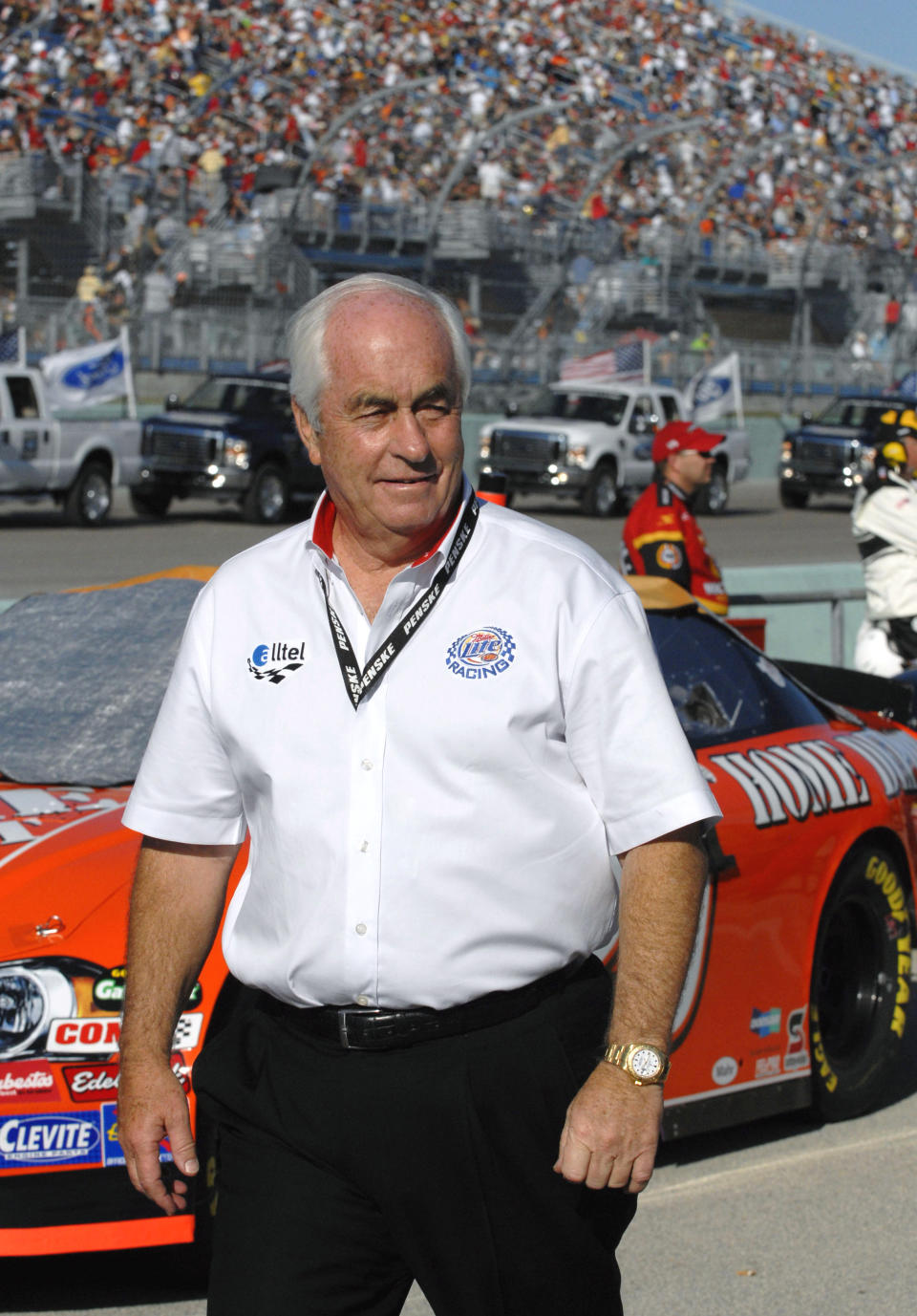 FILE - In this Nov. 18, 2007, file photo, team owner Roger Penske walks along pit road before the NASCAR Cup Series auto race at Homestead-Miami Speedway in Homestead, Fla. Penske’s drivers swept all the races at Indianapolis Motor Speedway and his reward has been induction into the NASCAR Hall of Fame. Penske will be honored Friday night along with Jeff Gordon, deceased drivers Davey Allison and Alan Kulwicki and fellow team owner Jack Roush. (AP Photo/Paul Kizzle, File)