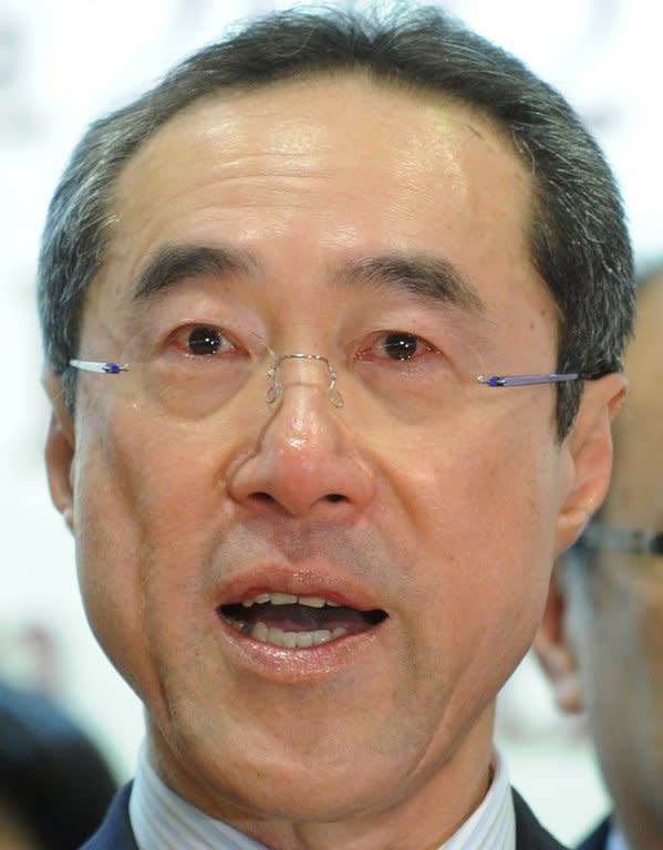 This file photo shows then Hong Kong chief executive candidate Henry Tang sheding tears during a press conference on March 25, 2012. Tang was set to become the chief executive until a series of gaffes and the discovery of an illegal basement containing the cellar at his luxury home made him deeply unpopular
