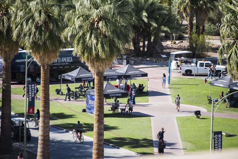 People visit the "Listen to America" tents at the University of Arizona.