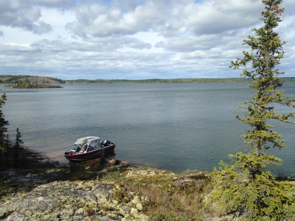 A boat in the East Arm of Great Slave Lake in 2016. Under agreements setting out how the Thaidene Nëné National Park Reserve will be managed, applications for business licences must be reviewed by a management board which, in turn, makes recommendations to Parks Canada. (Andrew Pacey/CBC - image credit)