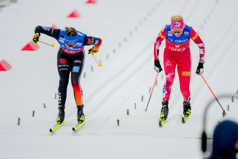 Germany's Katharina Hennig and Austria's Teresa Stadlober compete at the finish line of the women's 50 km mass start classic race during the FIS Cross-Country World Cup in Oslo. Beate Oma Dahle/NTB/dpa