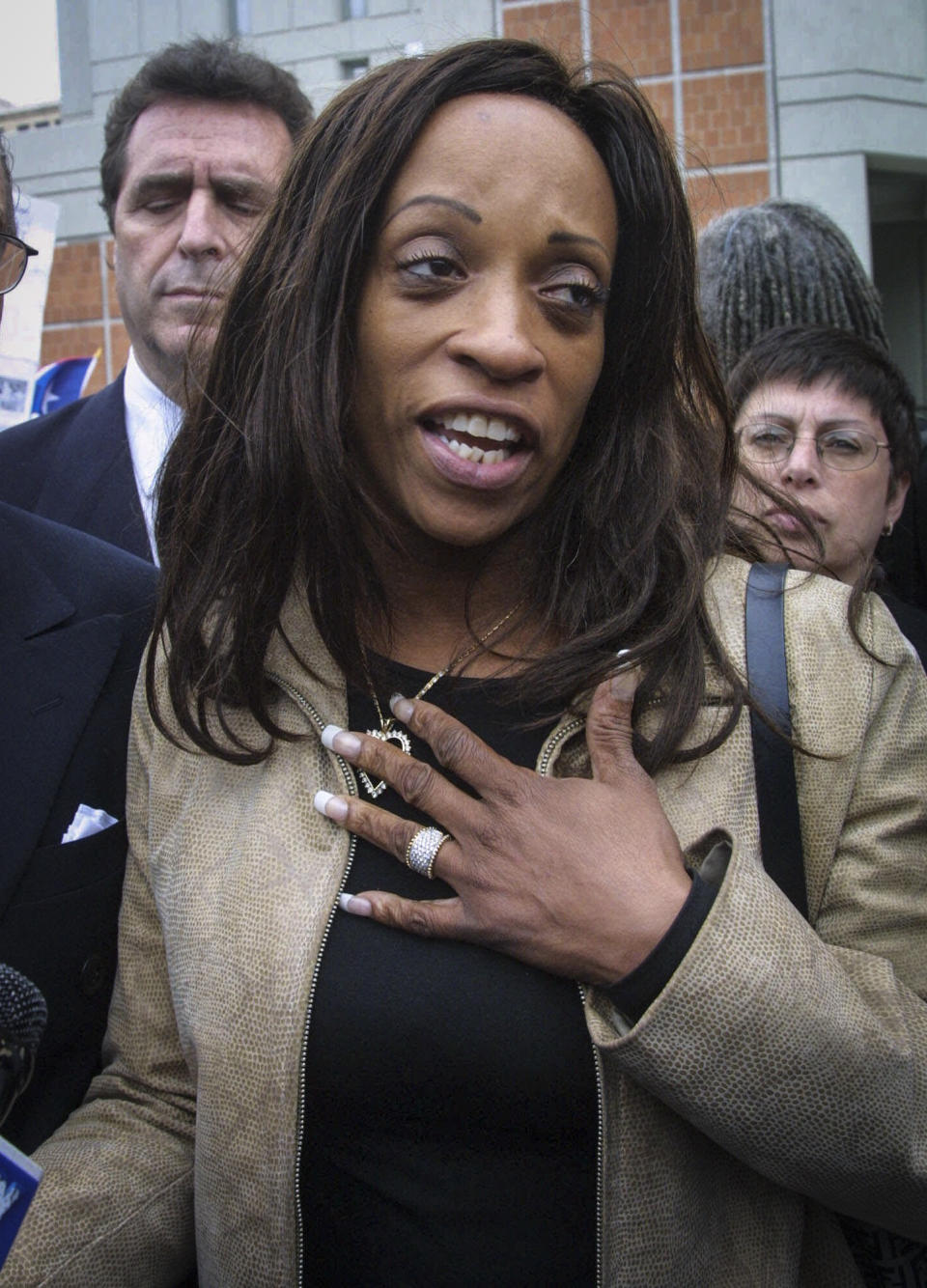 FILE - This Saturday May 26, 2001 file photo shows Kathy Jordan Sharpton as she meets with supporters following a visit to her husband the Rev. Al Sharpton at the Metropolitan Detention Center in the Brooklyn, N.Y. More than 16 years after separating, Rev. Al Sharpton has filed for divorce from his estranged wife, Kathy Jordan Sharpton. (AP Photo/Shawn Baldwin, File)