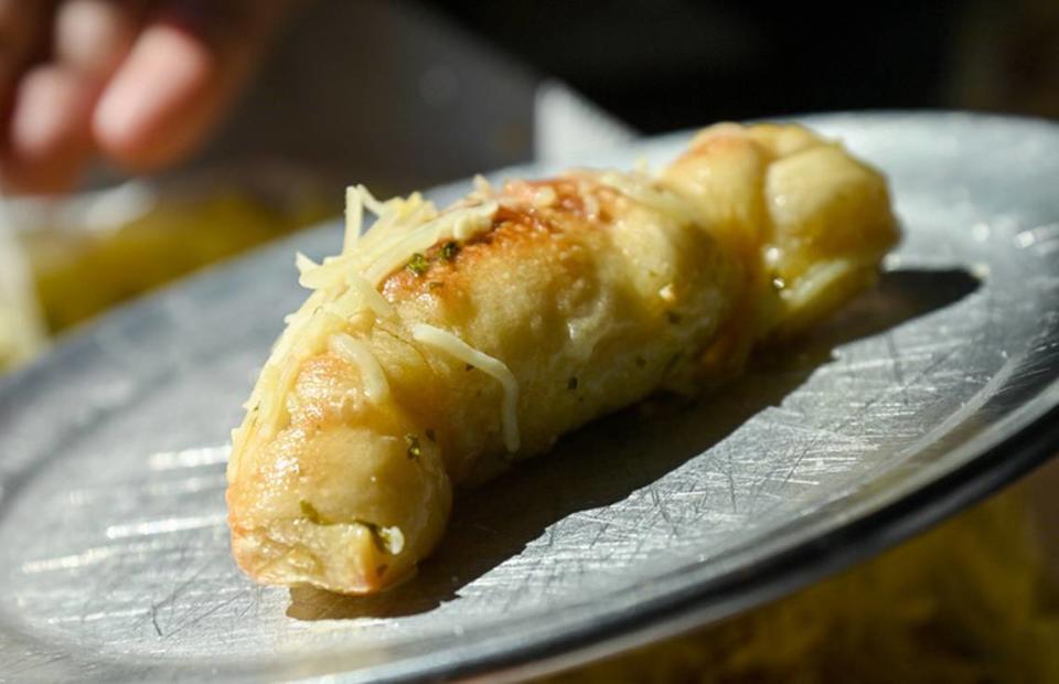 The garlic-buttered bread sticks are beloved at Macon’s Ingleside Village Pizza. (And, pssst, they’re bread sticks, not “knots.”)