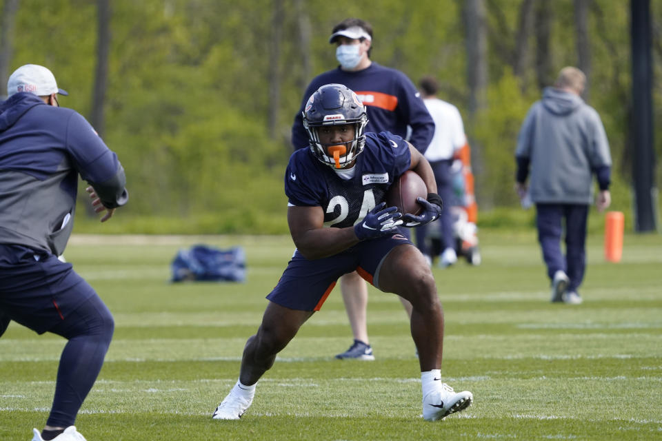 Chicago Bears running back Khalil Herbert (24) runs during the NFL football team's rookie minicamp Friday, May, 14, 2021, in Lake Forest Ill. (AP Photo/David Banks, Pool)