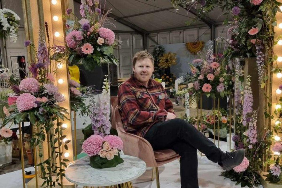 Daniel Spillane with his floral design <i>(Image: Submitted)</i>