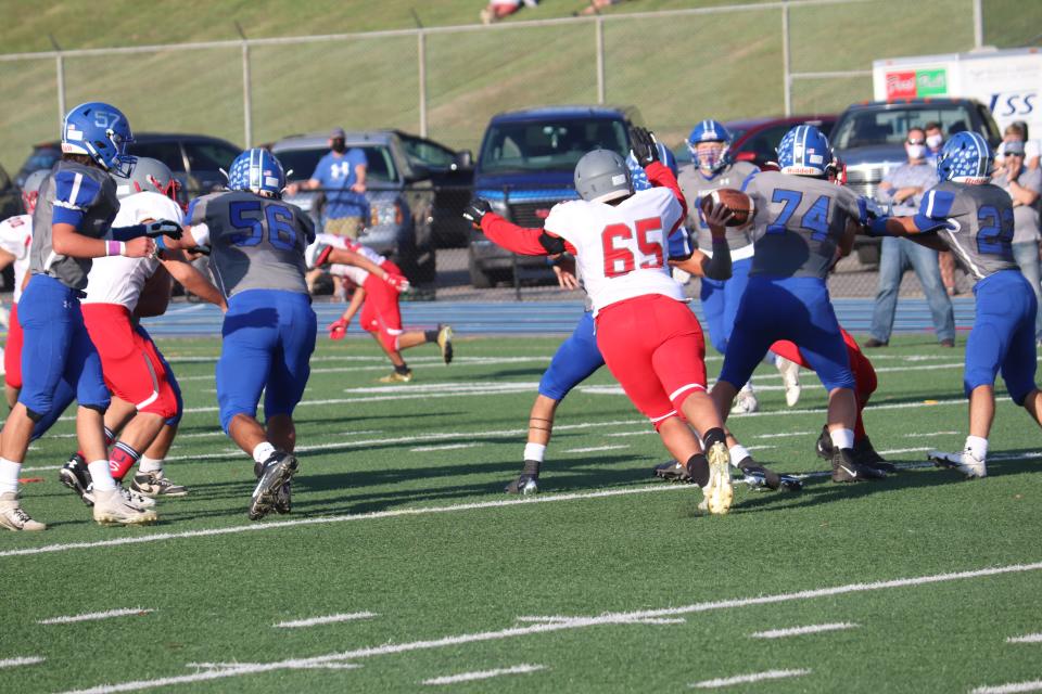 SJCC's Joel Noriega lunges to make a hit.