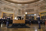 <p>The casket of evangelist Billy Graham arrives at the US Capitol Rotunda on Feb. 28, 2018 in Washington. (Photo: Mandel NganAFP/Getty Images) </p>