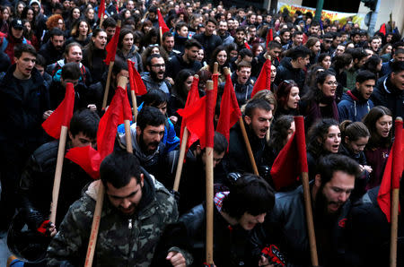 Protesters shout slogans as they march to the U.S. embassy during a rally marking the 45th anniversary of a 1973 student uprising against the military dictatorship that was ruling Greece, in Athens, Greece, November 17, 2018. REUTERS/Costas Baltas